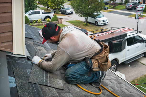 Professional Roof Leak Repair technician working in Alpine, NJ